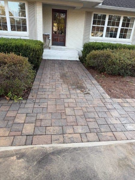 The same paver driveway after cleaning, color even and bright